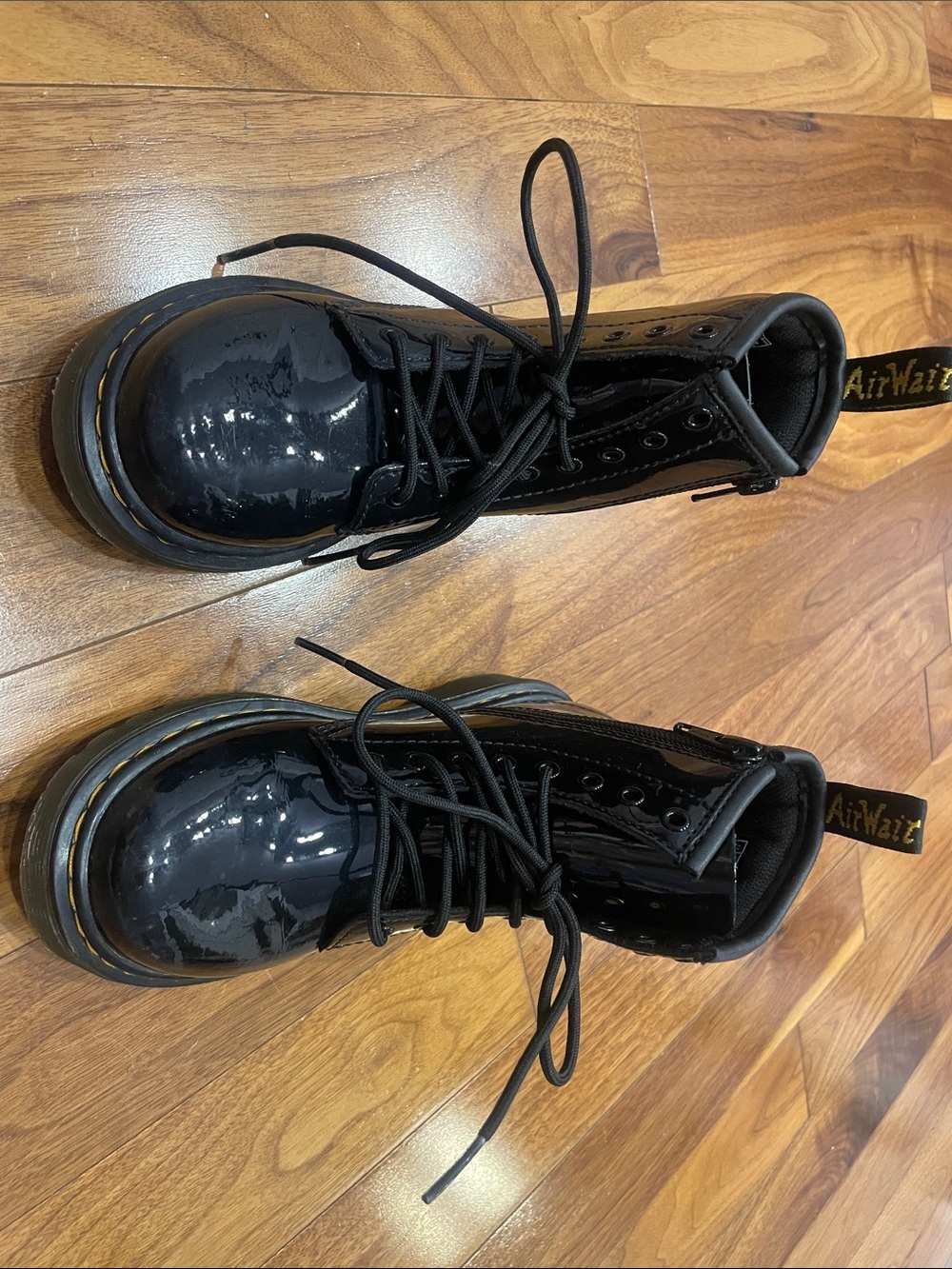 Dr. Martens Black Patent Leather Kids Lace-Up Boots with Yellow Stitching